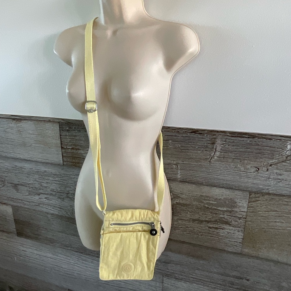 Kipling pale yellow crossbody bag purse